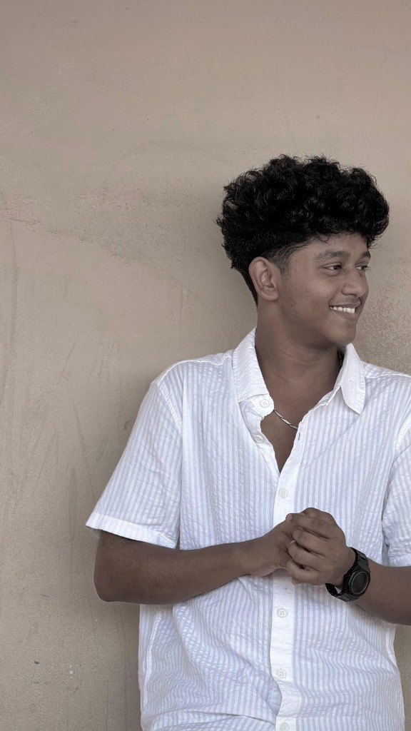 Goutham Krishna Portrait in White Shirt